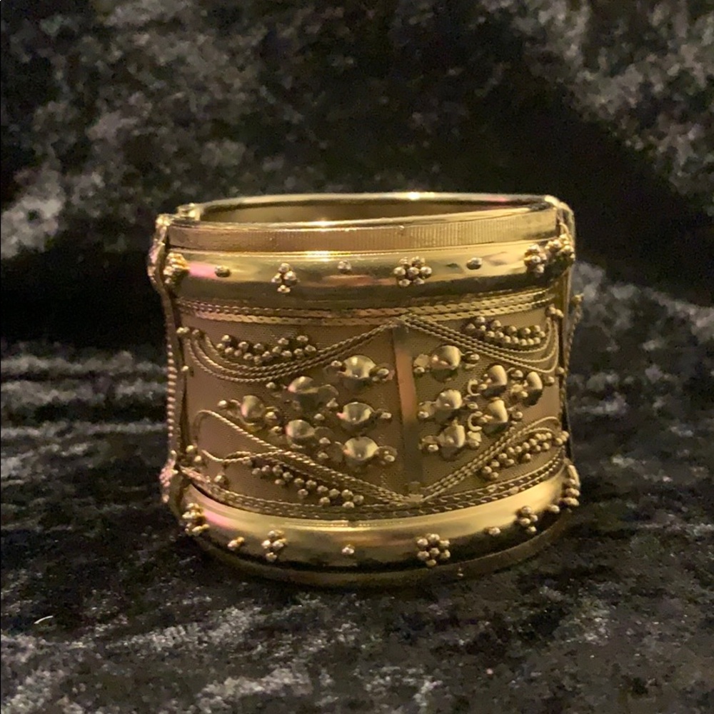 Womans brass bracket